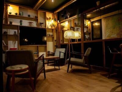 Botanik BCN Barcelona cannabis club interior with organic botanical design and comfortable seating areas
