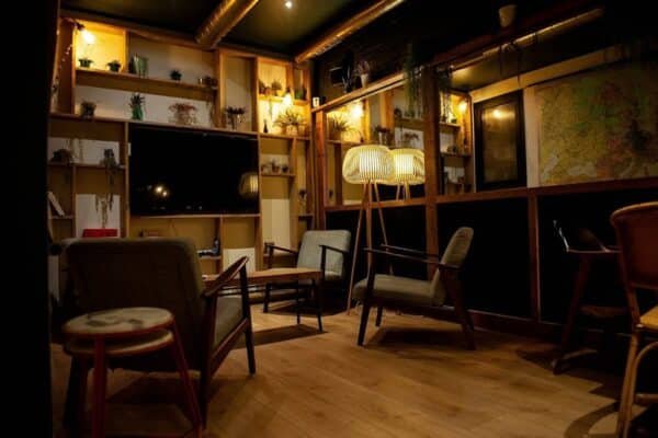 Botanik BCN Barcelona cannabis club interior with organic botanical design and comfortable seating areas